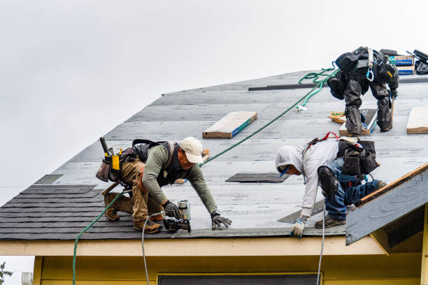 Professional Gutter Installation technician working in Owosso, MI